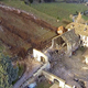 Illustration for article titled Giant boulder destroys building in Italy, another one misses by inches